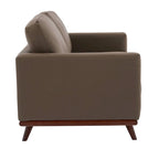 Nowoczesna sofa skórzana Chester dwuosobowa z podstawą z drewna brzozowego do salonu, sypialni, ogrodu, poczekalni - 58.27